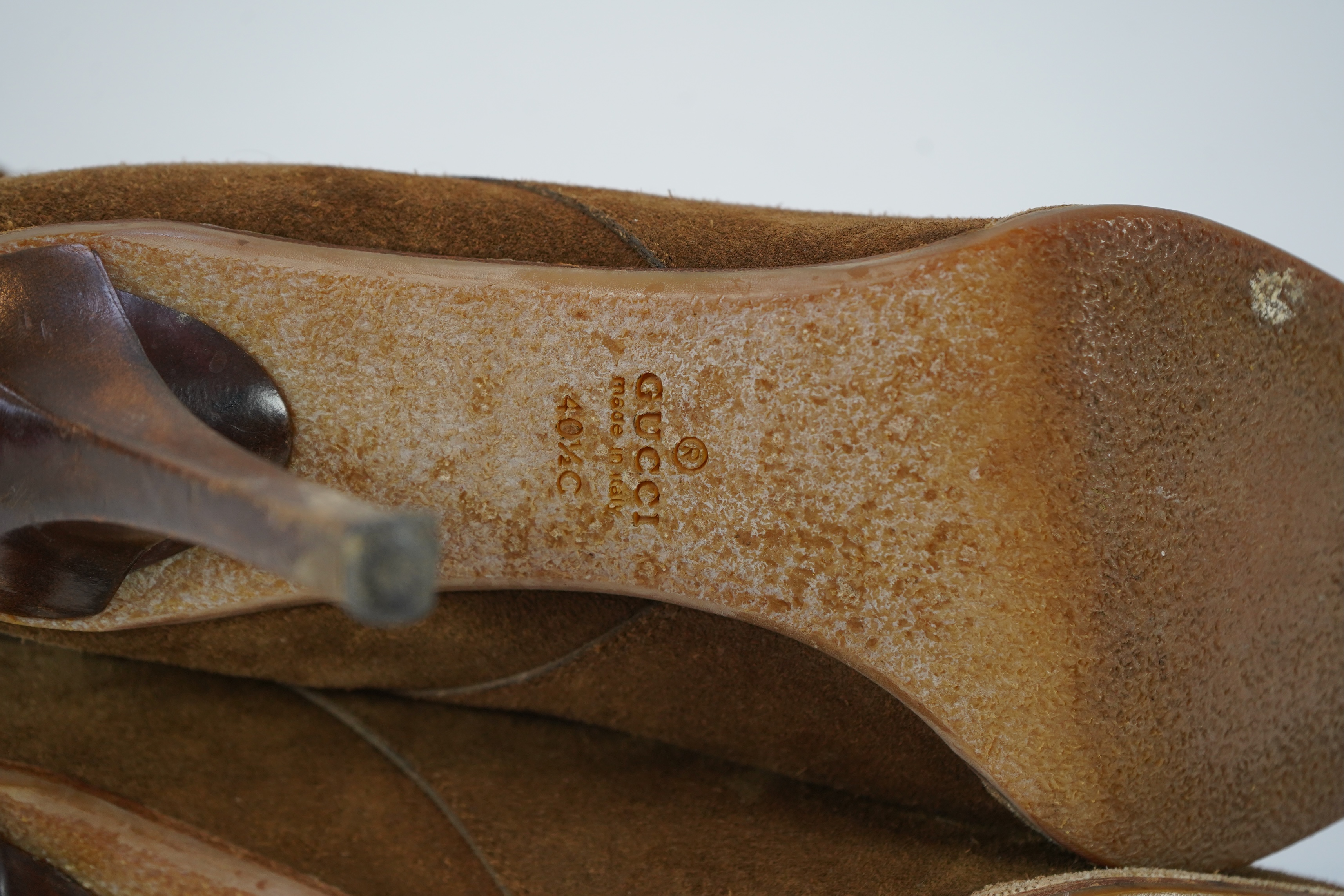 A pair of brown suede Gucci heeled ankle boots with buckle detail. size EU 40.5 (UK 7.5)